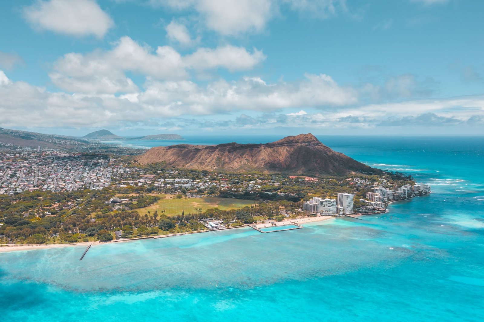 waterfront mountain city near turquoise ocean